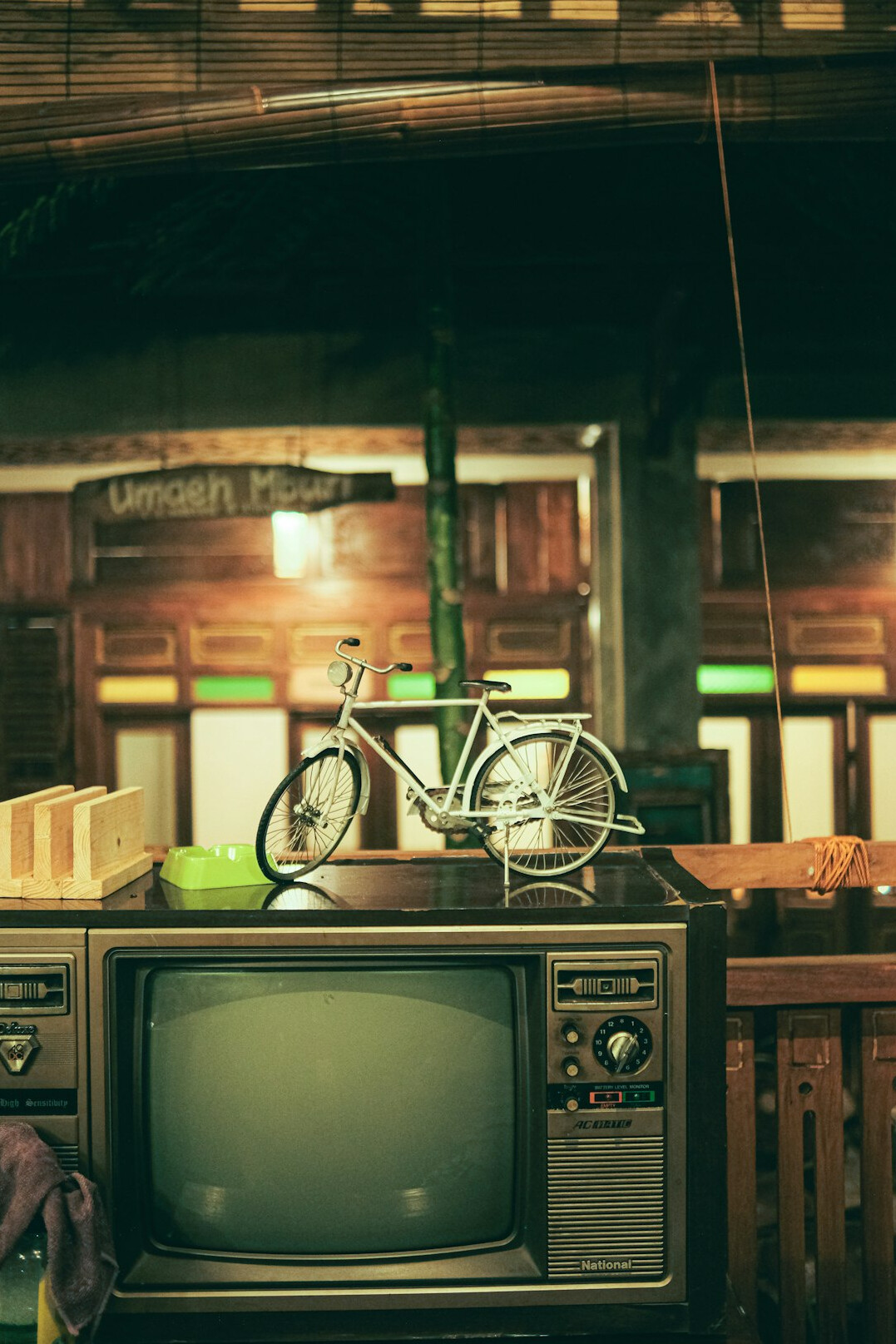 person relaxing with old tv
