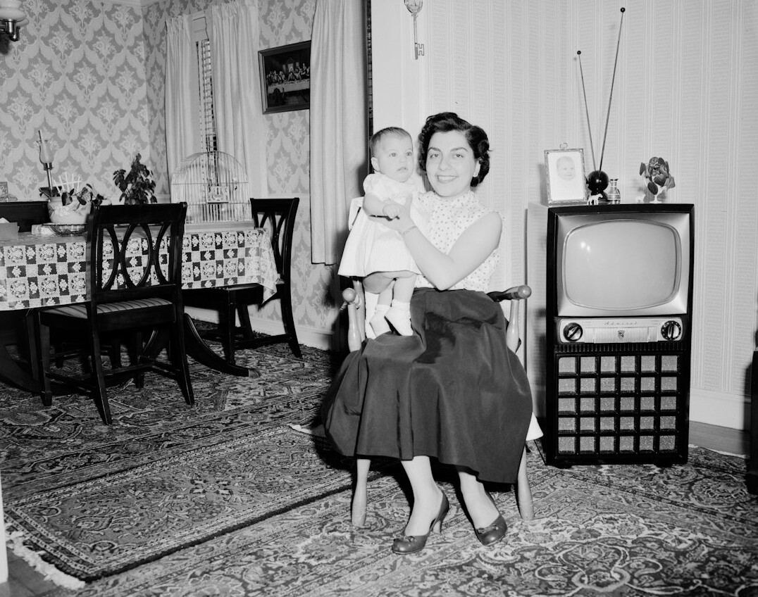 family watching old tv