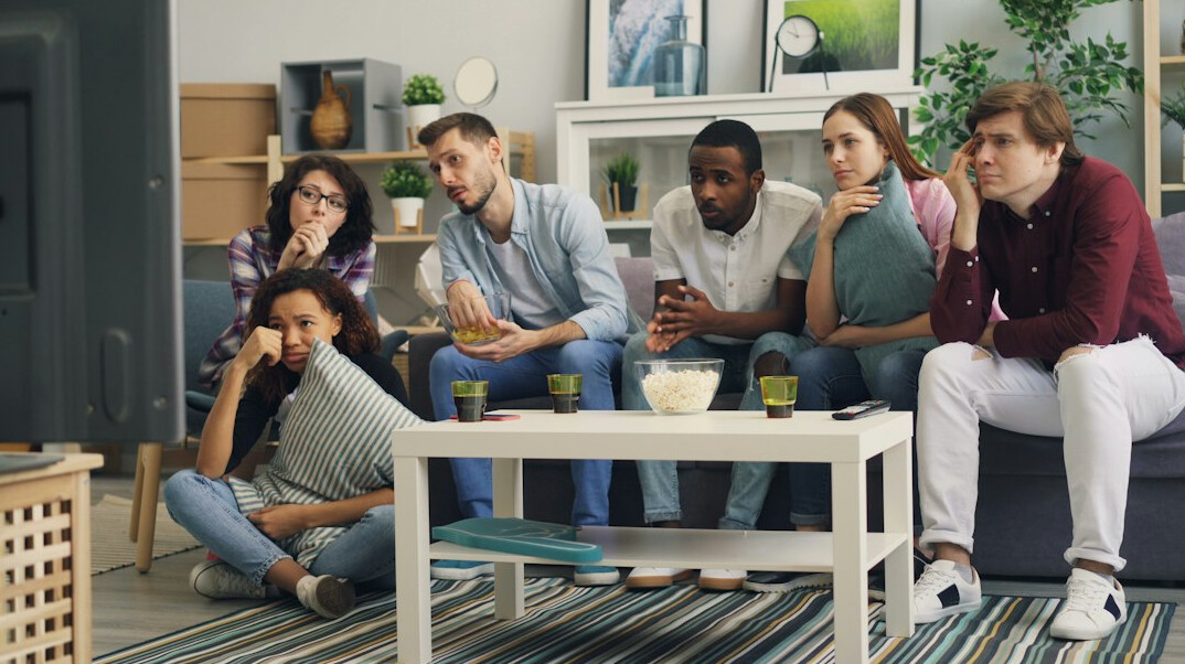 group of friends watching tv
